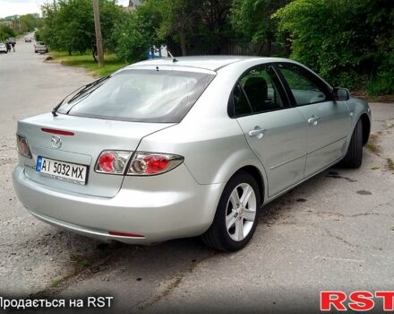 Серый Мазда 6, объемом двигателя 2 л и пробегом 215 тыс. км за 4800 $, фото 2 на Automoto.ua