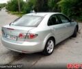 Серый Мазда 6, объемом двигателя 2 л и пробегом 215 тыс. км за 4800 $, фото 2 на Automoto.ua