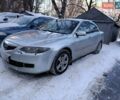 Серый Мазда 6, объемом двигателя 2 л и пробегом 242 тыс. км за 4999 $, фото 1 на Automoto.ua
