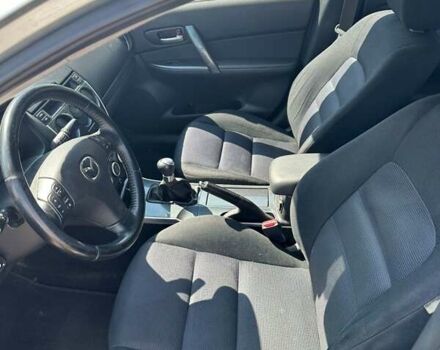 Серый Мазда 6, объемом двигателя 2 л и пробегом 330 тыс. км за 3899 $, фото 3 на Automoto.ua