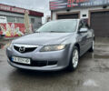 Серый Мазда 6, объемом двигателя 2 л и пробегом 233 тыс. км за 4200 $, фото 1 на Automoto.ua