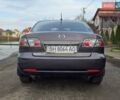 Серый Мазда 6, объемом двигателя 2 л и пробегом 159 тыс. км за 5999 $, фото 2 на Automoto.ua