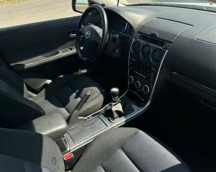 Серый Мазда 6, объемом двигателя 2 л и пробегом 330 тыс. км за 3899 $, фото 1 на Automoto.ua