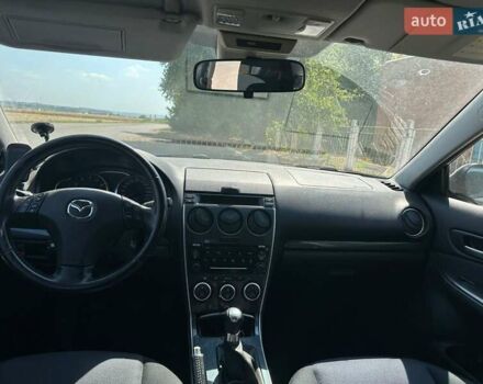 Серый Мазда 6, объемом двигателя 2 л и пробегом 330 тыс. км за 3899 $, фото 2 на Automoto.ua