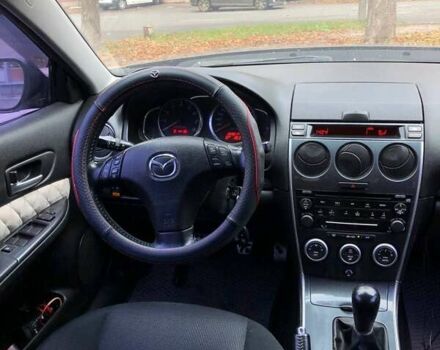Мазда 6 2006 у Черкасах на Automoto.ua Сірий Мазда 6, об'ємом двигуна 2 л та пробігом 269 тис. км за 4900 $, фото 8 на Automoto.ua