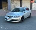 Серый Мазда 6, объемом двигателя 2 л и пробегом 243 тыс. км за 4999 $, фото 1 на Automoto.ua