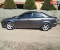 Серый Мазда 6, объемом двигателя 2 л и пробегом 245 тыс. км за 3600 $, фото 1 на Automoto.ua