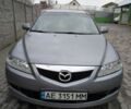 Серый Мазда 6, объемом двигателя 2 л и пробегом 257 тыс. км за 4400 $, фото 1 на Automoto.ua