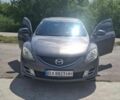Серый Мазда 6, объемом двигателя 2 л и пробегом 248 тыс. км за 5800 $, фото 1 на Automoto.ua
