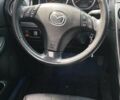 Серый Мазда 6, объемом двигателя 2 л и пробегом 205 тыс. км за 6400 $, фото 4 на Automoto.ua