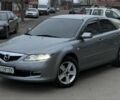 Серый Мазда 6, объемом двигателя 2 л и пробегом 323 тыс. км за 4750 $, фото 1 на Automoto.ua