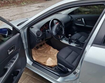 Серый Мазда 6, объемом двигателя 2 л и пробегом 201 тыс. км за 6300 $, фото 2 на Automoto.ua