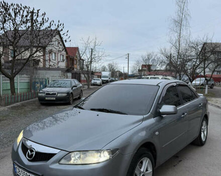 Серый Мазда 6, объемом двигателя 2 л и пробегом 323 тыс. км за 4750 $, фото 1 на Automoto.ua