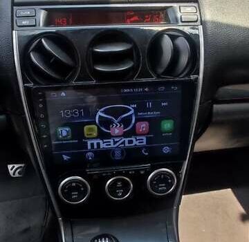 Серый Мазда 6, объемом двигателя 2.3 л и пробегом 163 тыс. км за 7999 $, фото 10 на Automoto.ua