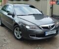 Серый Мазда 6, объемом двигателя 2 л и пробегом 246 тыс. км за 3700 $, фото 1 на Automoto.ua