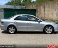 Сірий Мазда 6, об'ємом двигуна 2 л та пробігом 233 тис. км за 4999 $, фото 4 на Automoto.ua