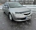Серый Мазда 6, объемом двигателя 2 л и пробегом 261 тыс. км за 6300 $, фото 1 на Automoto.ua