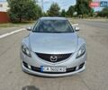 Серый Мазда 6, объемом двигателя 2 л и пробегом 288 тыс. км за 6450 $, фото 1 на Automoto.ua