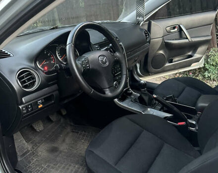 Серый Мазда 6, объемом двигателя 1.8 л и пробегом 235 тыс. км за 4400 $, фото 2 на Automoto.ua