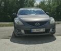 Сірий Мазда 6, об'ємом двигуна 2 л та пробігом 251 тис. км за 6006 $, фото 1 на Automoto.ua