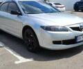 Серый Мазда 6, объемом двигателя 2 л и пробегом 205 тыс. км за 6400 $, фото 1 на Automoto.ua