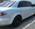 Серый Мазда 6, объемом двигателя 2 л и пробегом 205 тыс. км за 6400 $, фото 1 на Automoto.ua