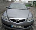 Серый Мазда 6, объемом двигателя 2 л и пробегом 257 тыс. км за 4200 $, фото 1 на Automoto.ua