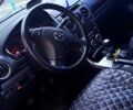 Серый Мазда 6, объемом двигателя 2 л и пробегом 200 тыс. км за 4500 $, фото 6 на Automoto.ua