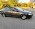 Серый Мазда 6, объемом двигателя 1.8 л и пробегом 233 тыс. км за 2899 $, фото 1 на Automoto.ua