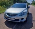 Серый Мазда 6, объемом двигателя 2 л и пробегом 265 тыс. км за 6300 $, фото 1 на Automoto.ua