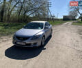 Серый Мазда 6, объемом двигателя 2 л и пробегом 230 тыс. км за 6800 $, фото 1 на Automoto.ua