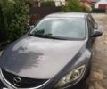 Серый Мазда 6, объемом двигателя 2 л и пробегом 257 тыс. км за 6300 $, фото 1 на Automoto.ua