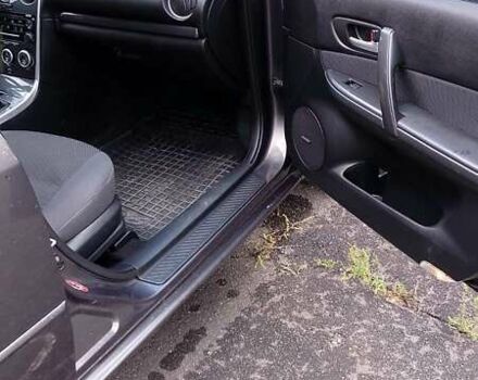 Серый Мазда 6, объемом двигателя 2 л и пробегом 233 тыс. км за 6200 $, фото 2 на Automoto.ua