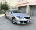 Серый Мазда 6, объемом двигателя 1.8 л и пробегом 128 тыс. км за 6950 $, фото 1 на Automoto.ua