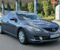 Серый Мазда 6, объемом двигателя 2 л и пробегом 349 тыс. км за 6700 $, фото 1 на Automoto.ua