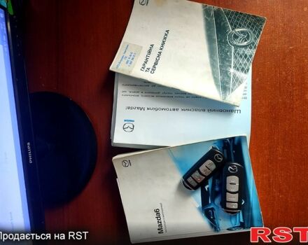 Серый Мазда 6, объемом двигателя 2.5 л и пробегом 264 тыс. км за 7100 $, фото 7 на Automoto.ua
