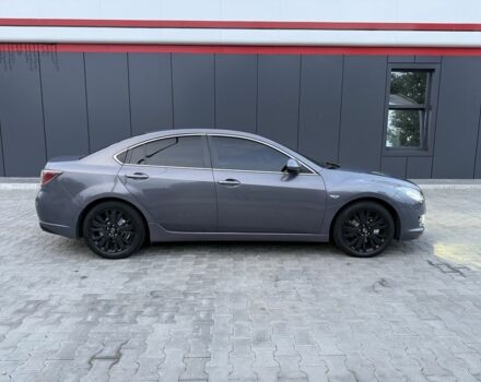 Серый Мазда 6, объемом двигателя 2 л и пробегом 245 тыс. км за 7400 $, фото 1 на Automoto.ua