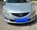 Серый Мазда 6, объемом двигателя 2 л и пробегом 245 тыс. км за 7600 $, фото 1 на Automoto.ua