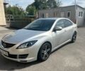 Серый Мазда 6, объемом двигателя 2 л и пробегом 255 тыс. км за 6990 $, фото 2 на Automoto.ua