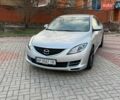 Серый Мазда 6, объемом двигателя 2 л и пробегом 252 тыс. км за 7999 $, фото 1 на Automoto.ua