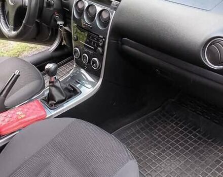 Серый Мазда 6, объемом двигателя 2 л и пробегом 233 тыс. км за 6200 $, фото 1 на Automoto.ua