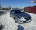 Серый Мазда 6, объемом двигателя 2 л и пробегом 285 тыс. км за 6400 $, фото 1 на Automoto.ua