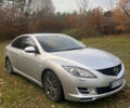 Серый Мазда 6, объемом двигателя 2 л и пробегом 230 тыс. км за 8500 $, фото 1 на Automoto.ua