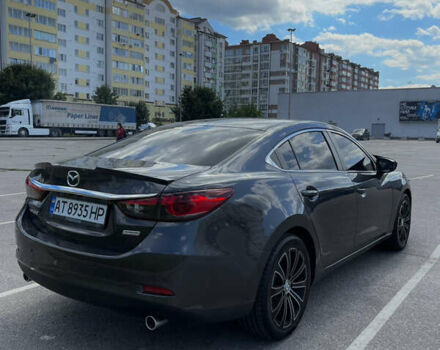 Сірий Мазда 6, об'ємом двигуна 2.18 л та пробігом 218 тис. км за 13000 $, фото 4 на Automoto.ua