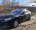 Серый Мазда 6, объемом двигателя 2 л и пробегом 255 тыс. км за 9800 $, фото 1 на Automoto.ua