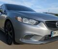Серый Мазда 6, объемом двигателя 2.49 л и пробегом 246 тыс. км за 9600 $, фото 1 на Automoto.ua