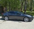 Сірий Мазда 6, об'ємом двигуна 2.2 л та пробігом 180 тис. км за 10500 $, фото 1 на Automoto.ua
