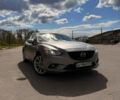 Серый Мазда 6, объемом двигателя 2.49 л и пробегом 128 тыс. км за 12000 $, фото 1 на Automoto.ua