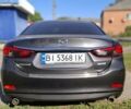 Серый Мазда 6, объемом двигателя 2 л и пробегом 125 тыс. км за 12000 $, фото 5 на Automoto.ua