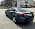 Серый Мазда 6, объемом двигателя 2.5 л и пробегом 180 тыс. км за 12500 $, фото 2 на Automoto.ua